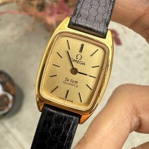 1980s Omega De Ville Women’s Quartz 
Tonneau/Barrel-shaped case
Gold Plated Case